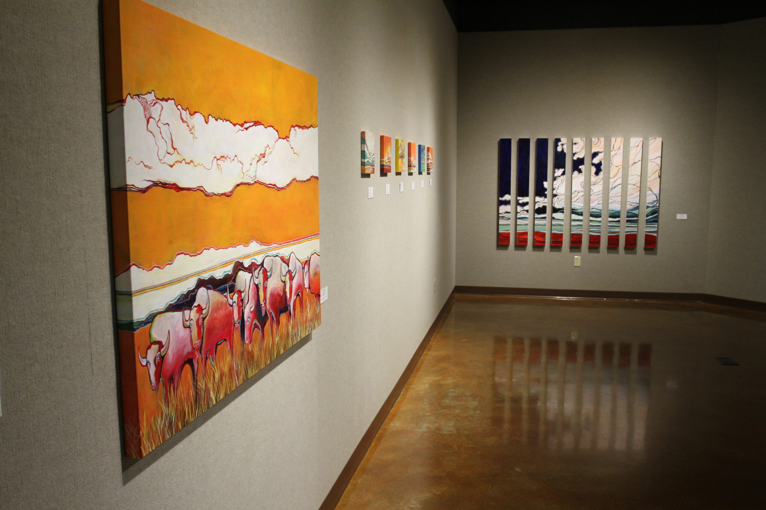 Orange cattle art in gallery