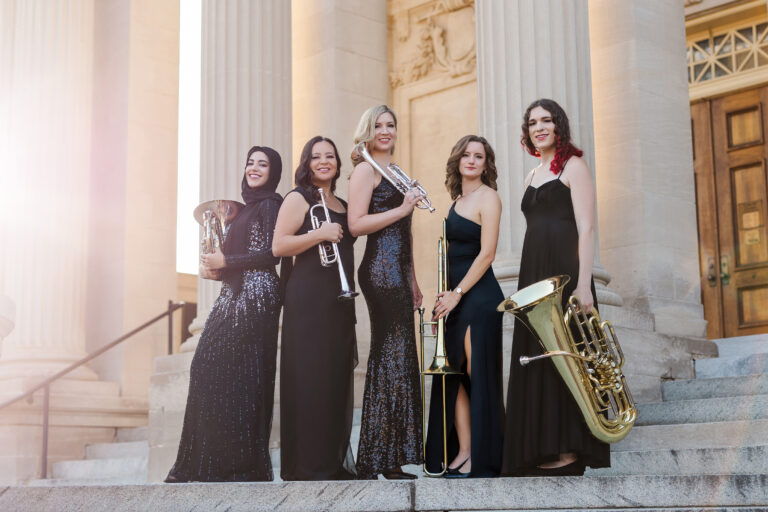 Seraph Brass -- five women in formal wear in front of large pillars