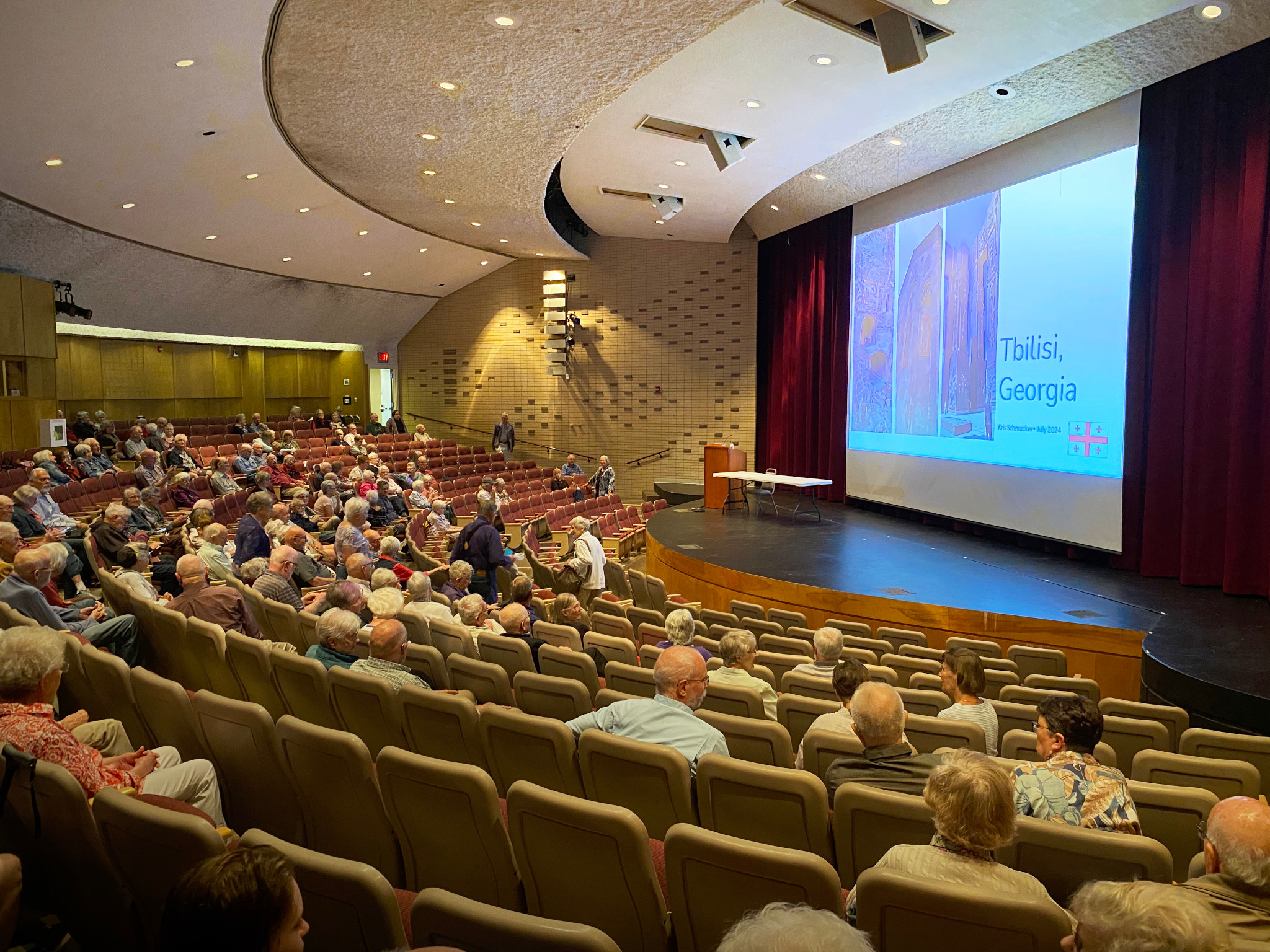 People listening to a presentation in Krehbiel Auditorum on the Bethel College Campus